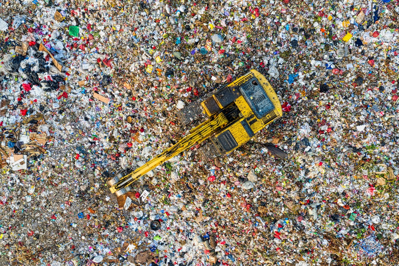 Tractor on a landfill with wasted food