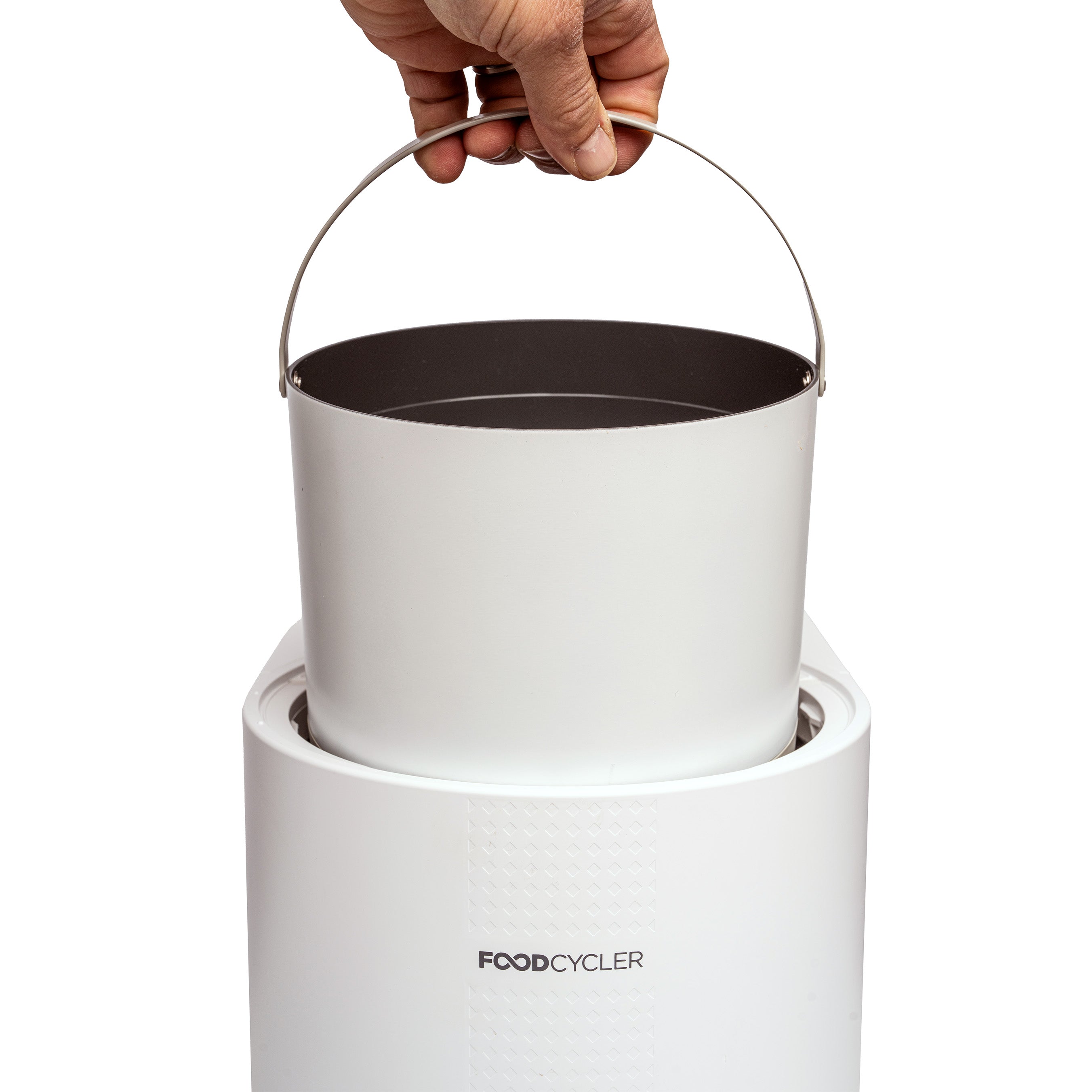 White FoodCycler Eco 3 portable bucket being placed into machine.