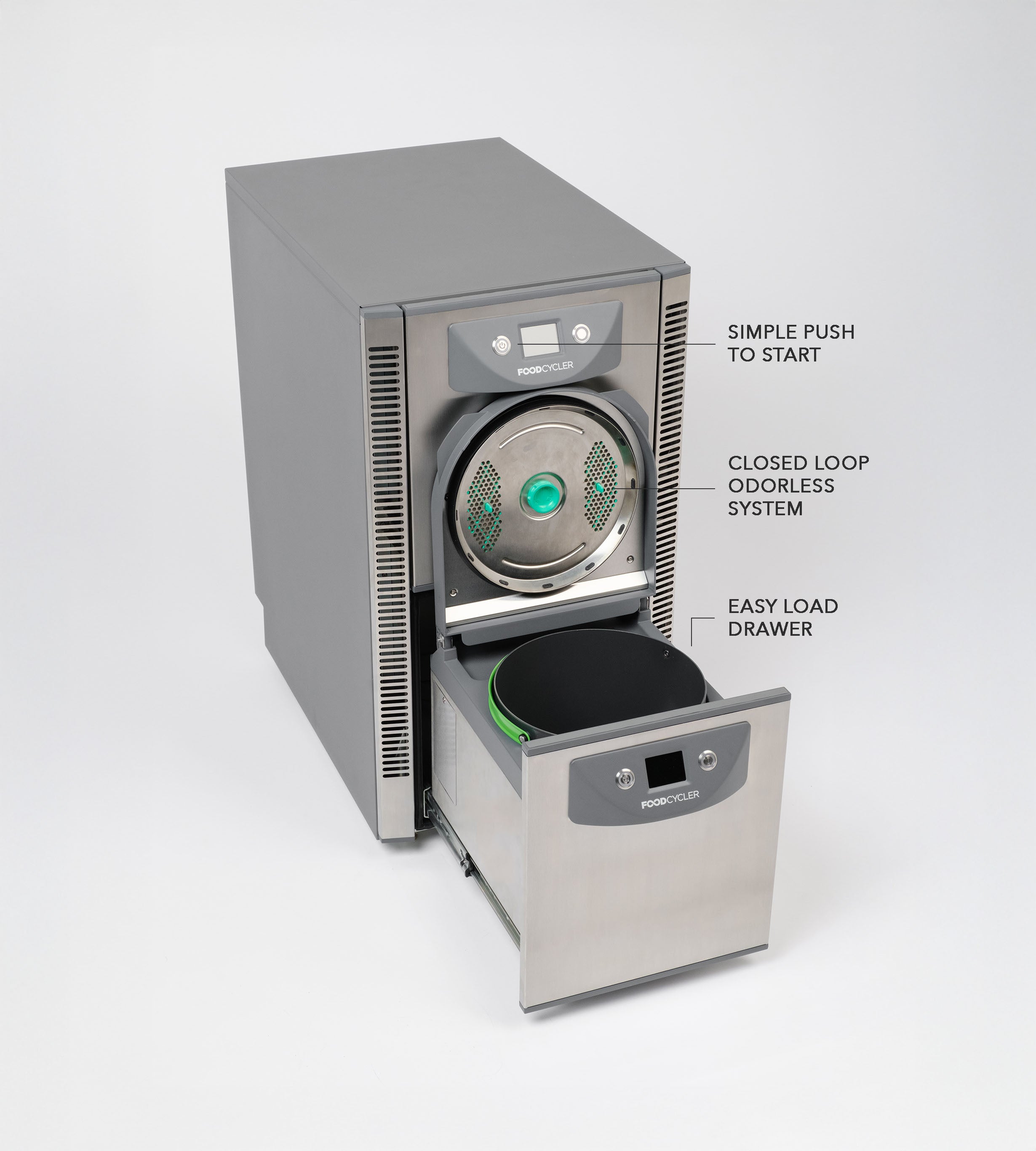 FoodCycler FC-75 with the lower drawer opened with a bucket inside. It has a simple push to start, a closed loop odorless system, and an easy load drawer.